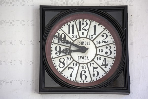 Classical clock in the University, Colégio do Esírito Santo, old University of Evora, Evora, district of Evora, Portugal
