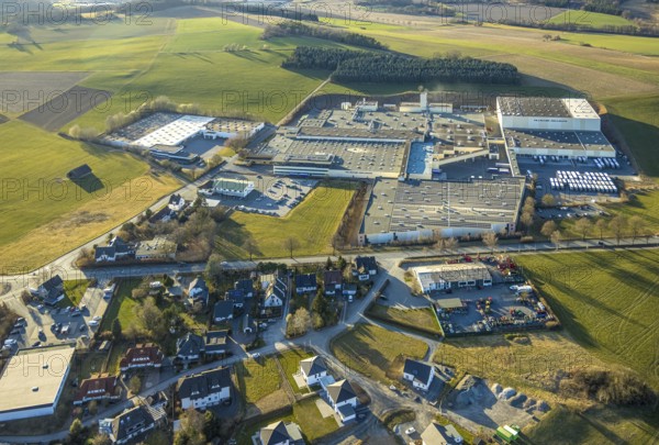 Aerial view, Stockum town centre, Tillmann Wellpappe-Verpackungen factory premises, commercial area, Stockum, Sundern, Sauerland, North Rhine-Westphalia, Germany, DE, Europe, commercial enterprises, commercial area, commercial property, commercial site, commercial use, industrial area, industrial site, aerial photograph, aerial photography, aerial photography, overview, bird's-eye view, bird's-eye view, overview