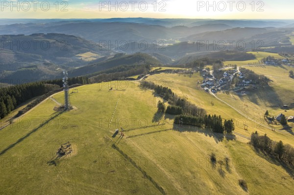 Aerial view, local view with distant view, observation tower Schomberg Richtfunkturm, Wildewiese-Homert called main ridge of the Homertrücken, forest area with forest damage, ski area in winter, Wildewiese, Sundern, Sauerland, North Rhine-Westphalia, Germany, viewing platform, DE, Europe, aerial view, aerial photography, aerial photography, Schombergturm, ski area, overview, bird's-eye view, residential area, birds-eyes view, overview