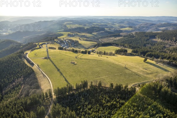 Aerial view, local view with distant view, observation tower Schomberg Richtfunkturm, Wildewiese-Homert called main ridge of the Homertrückens, forest area with forest damage, ski area in winter, Wildewiese, Sundern, Sauerland, North Rhine-Westphalia, Germany, viewing platform, tree death, DE, Europe, hilly landscape, clear-cutting, aerial view, aerial photography, aerial photography, Schombergturm, ski area, overview, bird's-eye view, forest damage, forest death, birds-eyes view, overview