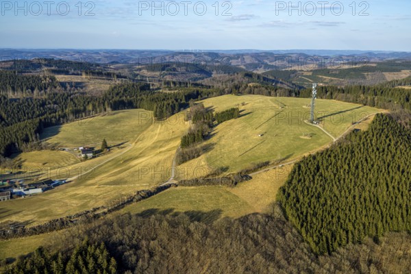 Aerial view, local view and blue sky with distant view, observation tower Schomberg Richtfunkturm, Wildewiese-Homert called main ridge of the Homertrücken, forest area with forest damage, ski area in winter, Wildewiese, Sundern, Sauerland, North Rhine-Westphalia, Germany, viewing platform, DE, Europe, aerial view, aerial photography, aerial photography, Schombergturm, ski area, overview, bird's eye view, birds-eyes view, overview
