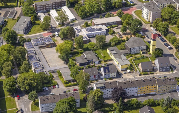 Aerial view, catholic Sonnenschule primary school and Städt. Community primary school Wielandstraße Regenbogenschule with roof with solar panels, church tower with community centre Siepen, Neviges, Velbert, Ruhr area, North Rhine-Westphalia, Germany, place of worship, education, DE, roof with solar panels, Europe, photovoltaic, place of worship, primary school, sanctuary, church, parish, educational institute, aerial view, aerial photography, aerial photography, photovoltaic system, religion, school, solar, solar system, solar roof, solar energy, solar panels, solar power system, overview, bird's eye view, birds-eyes view, overview