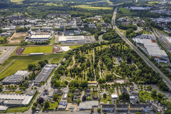 Aerial view, cemetery of the evang. Cemetery and chapel, EMKA sports centre and A535 motorway, behind industrial estate Industriestraße, Velbert, Ruhr area, North Rhine-Westphalia, Germany, burial site, DE, Europe, cemetery, memorial site, commercial enterprises, commercial area, commercial property, commercial use, Gottesacker, graves, burial ground, industrial site, aerial photograph, aerial photography, aerial photography, resting place, overview, bird's-eye view, birds-eyes view, overview, VelbertMitte