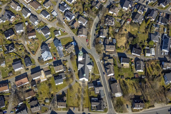 Aerial view, residential area and Roman Catholic parish church St. Kunibertus in the town centre, Hünsborn, Wenden, Sauerland, North Rhine-Westphalia, Germany, place of worship, DE, monument protection, Europe, religious community, place of worship, property tax, holy site, real estate, church, parish, denomination, aerial view, aerial photography, aerial photography, religion, religious site, overview, bird's-eye view, residential area, living and life, residential area, residential quality, residential quarter, housing estate, residential district, birds-eyes view, overview