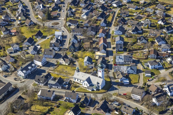Aerial view, Roman Catholic parish church St. Kunibertus Kirche Hünsborn und Wohngebiet Ortsansicht Ortsteil Hünsborn, Wenden, Sauerland, North Rhine-Westphalia, Germany, place of worship, DE, Europe, place of worship, property tax, holy place, real estate, church, parish, aerial view, aerial photography, aerial photography, religion, religious site, overview, bird's-eye view, residential area, living and life, residential area, residential quality, residential neighbourhood, housing estate, residential area, birds-eyes view, overview