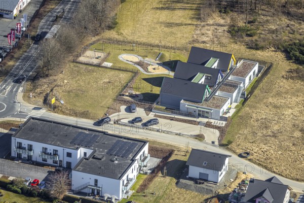 Aerial view, construction site and new building Kita GFO Kindergarten St. Anna Hünsborn, Über der Delle, shopping centre Nahkauf supermarket at roundabout Siegener Straße, Hünsborn, Wenden, Sauerland, North Rhine-Westphalia, Germany, DE, Europe, kindergarten, day care centre, day care centre, aerial view, aerial photography, aerial photography, overview, bird's-eye view, overview