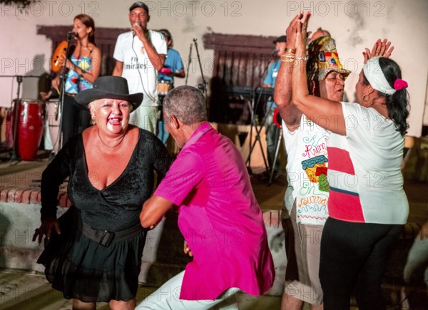 Old Cubans dance at the Salza market to the music of a live band, Trinidad, Cuba, Sancti Spíritus, Cuba, Sancti Spíritus