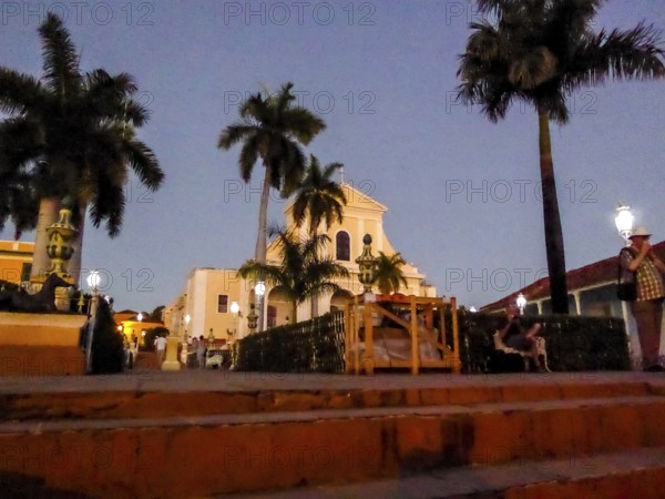 Ingelsia de la Santisima Trinidad with lantern in the centre of Trinidad with palm trees, Trinidad, Cuba, Sancti Spíritus, Cuba