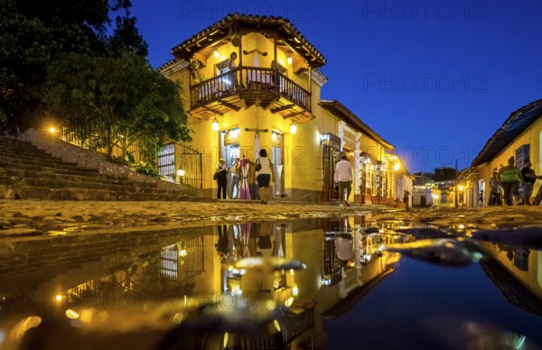 Restaurant and pub in the old town of Trinidad with visitors during the blue hour, Trinidad, Cuba, Sancti Spíritus, Cuba, Sancti Spíritus