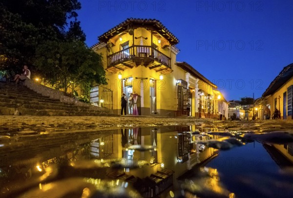 Restaurant and pub in the old town of Trinidad with visitors during the blue hour, Trinidad, Cuba, Sancti Spíritus, Cuba, Sancti Spíritus