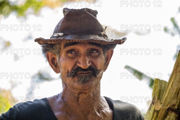 Sugar cane farmer in Valle de los Ingenios, portrait with hat, Trinidad, Cuba, Sancti Spíritus, Cuba, Sancti Spíritus