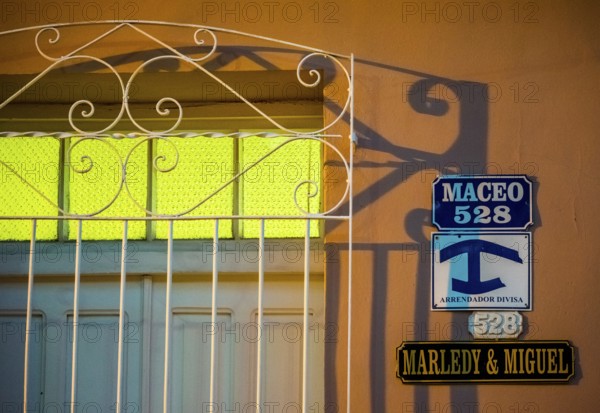 Street signs with the indication of a private accommodation for tourists of a Casa Paricular, street scene in the old town of Trinidad, Trinidad, Cuba, Sancti Spíritus, Cuba, Sancti Spíritus