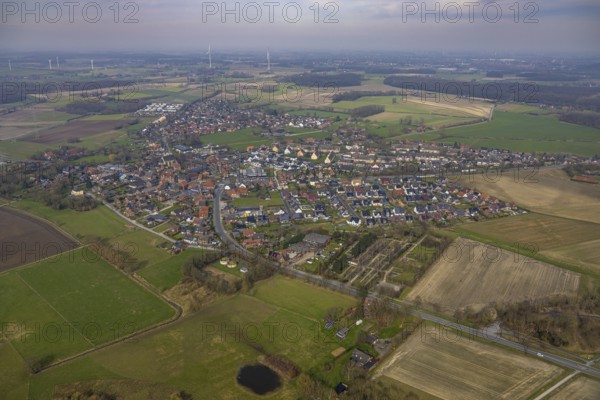 Aerial view, residential area local view district Dolberg, surrounded by meadows and fields, wind turbines, Ahlen, Dolberg, Ruhr area, Germany, residential area, local view, district Dolberg, meadows, fields, nature, landscape, environment, energy, renewable energy, development, houses, greenery, rural, district, town, European, infrastructure, settlement, residential, area, village, ecology, sustainability, panorama, view, idyllic, peaceful, residential buildings