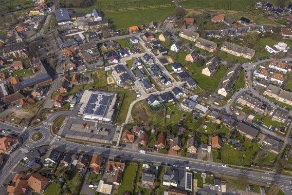 Aerial view, residential area local view district Dolberg, new REWE supermarket with solar roof, wind turbines, new roundabout Alleestraße and Uentroper Straße, new residential area Hases Wiese, catholic St. Lambertus church, Ahlen, Dolberg, Ruhr area, Germany, residential area, district, REWE supermarket, solar roof, roundabout, Alleestraße, Uentroper Straße, new building, Hases Wiese, catholic, St. Lambertus Church, architecture, infrastructure, modern, energy, sustainable, traffic, roads, buildings, church tower, residential buildings, urban, town planning, green spaces, shopping facilities, supply, community, environmentally friendly, renewable energy, district