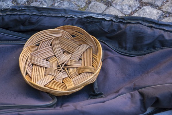 Basket of street musicians in the historic centre of Lisbon, Lisbon, Lisbon district, Portugal