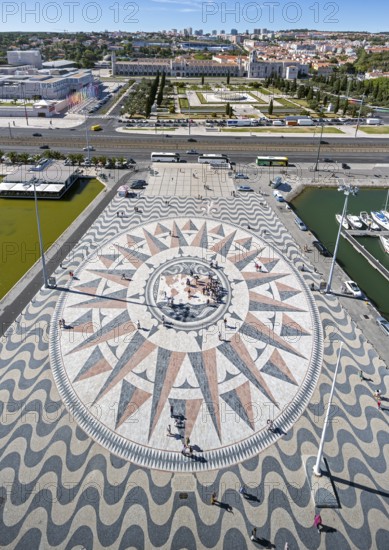 The large compass in the wave pavement in front of the Monumento a Los Descubrimientos, Lisbon, District of Lisbon, Portugal