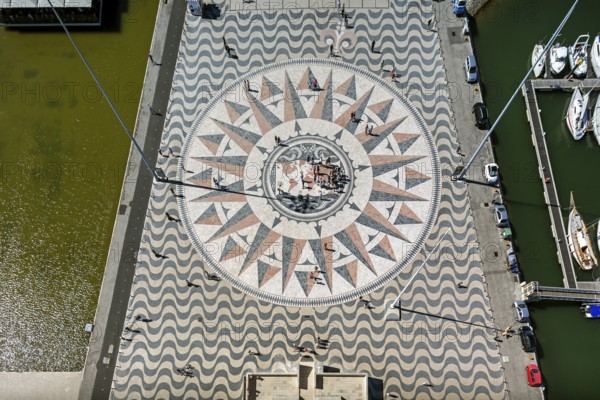The large compass in the wave pavement in front of the Monumento a Los Descubrimientos, Lisbon, District of Lisbon, Portugal