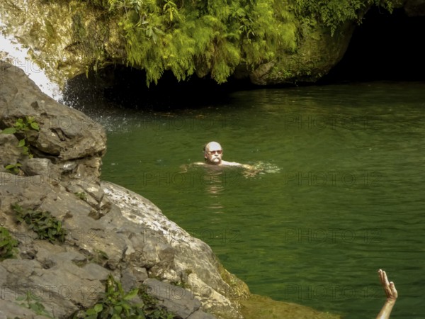 Small bathing lake in the Valle de los Ingenios with tourists, Trinidad, Cuba, Sancti Spíritus, Cuba