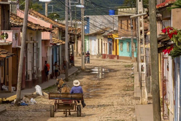 Cuban rider cowboy with his horse in the streets of Trinidad, Trinidad, Cuba, Sancti Spíritus, Cuba, Sancti Spíritus
