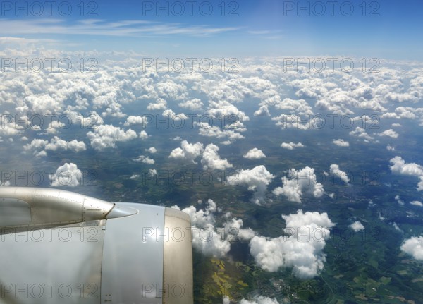 Cumulus clouds over Rhineland-Palatinate, jet engine, view from a Boeing, Idar-Oberstein, Rhineland-Palatinate, Germany, Europe, aerial view, birds-eyes view, Travel, travel photography