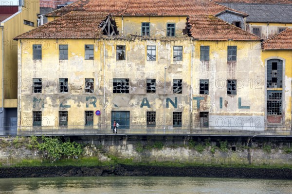 Old warehouse on the Douro, decay, labelling Mercantil, Oporto, Porto district, Portugal, Europe, aerial view, birds-eyes view, travel, travel photography