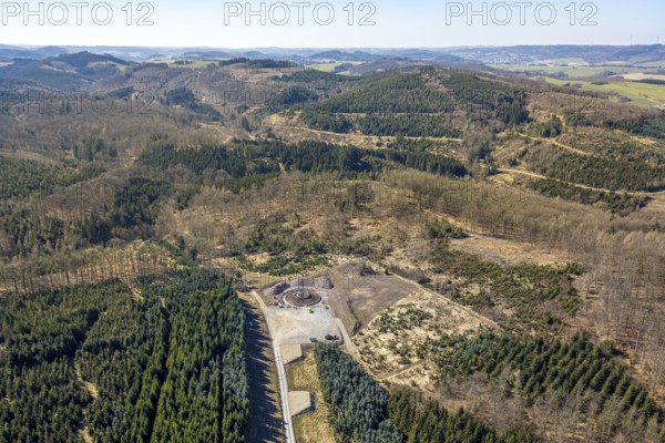 Aerial photo, construction site for wind turbine, forest damage at Eichenberg, Amecke, Sundern, Sauerland, North Rhine-Westphalia, Germany, alternative energy, construction work, construction area, building site, building plots, construction measure, tree death, construction project, construction site, bark beetle damage, bark beetle plague, DE, Europe, spruce dieback, clear-cutting, calamity areas, aerial photography, aerial photography, aerial photography, new construction, overview, bird's-eye view, WTG, forest, forest damage, forest dieback, wind energy, wind power, wind turbine, wind wheel, wind turbines, birds-eyes view, overview