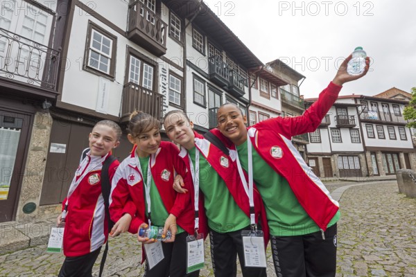 Young sportswomen in the historic centre of Guimaraes, Guimaraes, Braga district, Portugal, Europe, aerial view, birds-eyes view, Travel, Travel photography