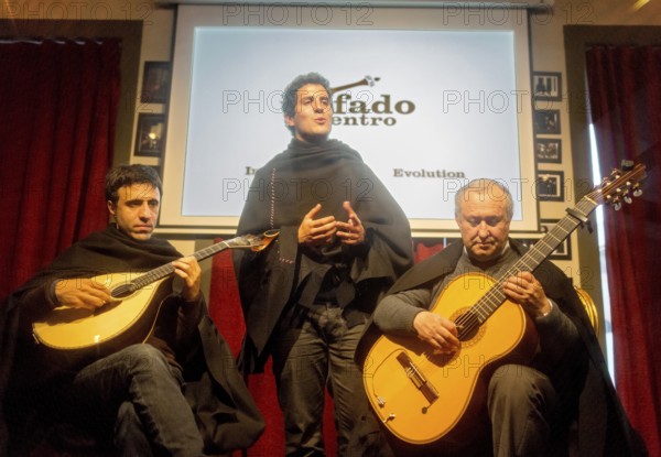 Fado singing and fado performance in a cultural centre in Coimbra, Coimbra, Coimbra district, Portugal, Europe, BlosseyPortugal, aerial view, birds-eyes view, Travel, travel photography