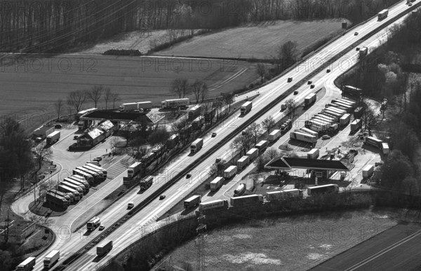 Aerial photo, Serways service area Soester Börde on the A44 motorway, truck parking, black and white photo, Müllingsen, Soest, Soester Börde, North Rhine-Westphalia, Germany, motorway, DE, Europe, aerial photo, aerial photography, aerial photography, rest area, service area, road traffic, overview, bird's-eye view, overview
