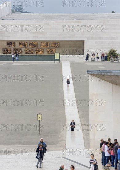 Penitents slide on their knees across the forecourt of the Basilica of Fatima, Fátima, District of Santarém, Portugal, Europe, Fátima, District of Santarém, Aerial view, birds-eyes view, Travel, Travel photography