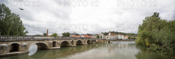Renaissance bridge Ponte Velha over the Nabao near the old town of Tomar with the Convento de Cristo in the background, Tomar, Santarém district, Portugal, Europe, Santarém district, aerial view, birds-eyes view, Travel, Travel photography