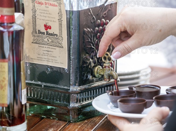 Coffee liqueur served in chocolate cups, a local speciality, Ãbidos, Leiria district, Portugal, Europe, Óbidos, aerial view, birds-eyes view, Travel, travel photography