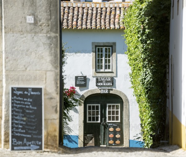 Within the castle walls lie Malrean alleys, picturesque small town of Obidos, Ãbidos, Leiria district, Portugal, Europe, Óbidos, aerial view, birds-eyes view, Travel, travel photography