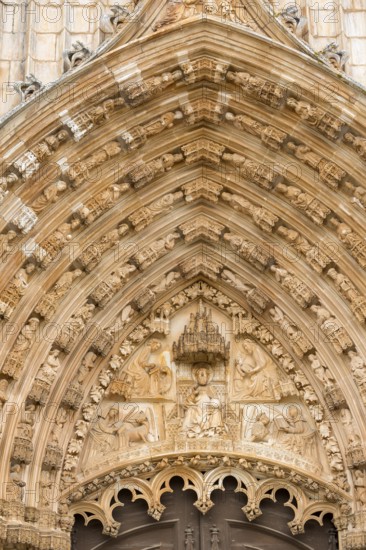 Apostle figures, Monastery of Santa Maria da VitÃüria, UNESCO World Heritage Site, main portal with four-winged angels, monastery church of Batalha, Mosteiro da Batalha, Batalha, Leiria district, Portugal, Europe, aerial view, birds-eyes view, travel, travel photography