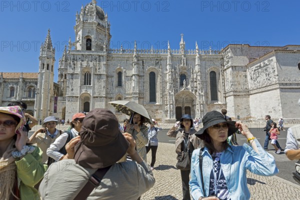 Japanese tourists in front of the Mosteiro dos Jerónimos, UNESCO World Heritage Site, Lisbon, Lisbon District, Portugal