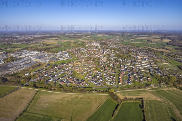 Aerial view, residential area, view of Bork district with distant view and blue sky, commercial area on the left, Selm, Münsterland, North Rhine-Westphalia, Germany, DE, Europe, property tax, real estate, aerial view, aerial photography, aerial photography, overview, bird's-eye view, residential area, living and living, residential area, residential quality, residential neighbourhood, housing estate, residential district, birds-eyes view, overview