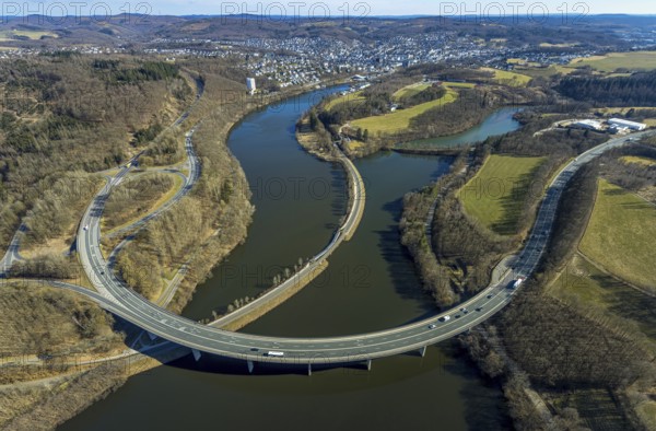 Aerial view, Biggesee with forest area, Obersee with bridge Landesstraße L512, curved bridge Bundesstraße B54, Olpe-Stadt, Olpe, Sauerland, North Rhine-Westphalia, Germany, Biggetalsperre, bridge, Bundesstraße B54, DE, Europe, shapes and colours, hilly landscape, aerial view, aerial photography, aerial photography, nature park Ebbegebirge, lake, reservoir, overview, bird's eye view, forebay, birds-eyes view, overview