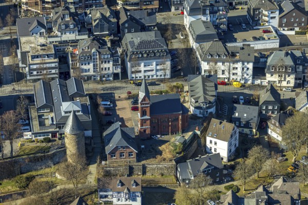 Aerial view, city wall with witch tower, evang. Church Olpe, OT Olpe youth centre and children's centre, residential area Frankfurter Straße, Olpe town, Olpe, Sauerland, North Rhine-Westphalia, Germany, place of worship, DE, Europe, religious community, place of worship, property tax, holy place, real estate, church, parish, denomination, aerial view, aerial photography, aerial photography, religion, religious site, tower, overview, bird's-eye view, watchtower, residential complex, living and life, residential area, quality of life, residential neighbourhood, housing estate, residential area, birds-eyes view, overview