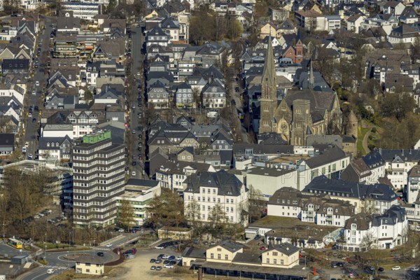 Aerial view, former Olpe railway station, left Olpe town hall, Altes Lyzeum (music school) and shopping centre, city and St. Martinus catholic church, roundabout Stellwerkstraße, Olpe city, Olpe, Sauerland, North Rhine-Westphalia, Germany, place of worship, authority, DE, Europe, religious community, place of worship, holy place, church, parish, denomination, aerial view, aerial photography, aerial photography, religion, religious site, overview, bird's eye view, birds-eyes view, overview