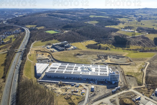 Aerial view, commercial area Nicolaus-Otto-Straße with construction site and new building Alte Landstraße and Am Bratzkopf, forest area and distant view, Olpe town, Olpe, Sauerland, North Rhine-Westphalia, Germany, DE, Europe, commercial enterprises, commercial area, commercial property, commercial park, commercial location, commercial use, industrial location, aerial view, aerial photography, aerial photography, overview, bird's-eye view, overview