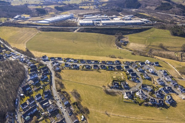 Aerial view, single-family house, housing estate and playground Ebbeblick, behind motorway A45 and A1 Zaundiscount Olpe Zaunfachhandel, Olpe-Stadt, Olpe, Sauerland, North Rhine-Westphalia, Germany, DE, Europe, commercial enterprises, commercial area, commercial property, commercial location, commercial use, property tax, real estate, industrial location, aerial view, aerial photography, aerial photography, overview, bird's-eye view, residential area, housing and living, residential area, residential quality, residential neighbourhood, residential district, birds-eyes view, overview