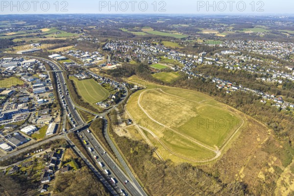 Aerial view, Kippe Projektentwicklung Enerke GmbH An der Kohlenbahn, motorway A1 with traffic jam, Grundschöttel, Wetter, Ruhr area, North Rhine-Westphalia, Germany, DE, Europe, truck traffic jam, aerial view, aerial photography, aerial photography, road traffic, overview, bird's eye view, Wetter (Ruhr), birds-eyes view, overview