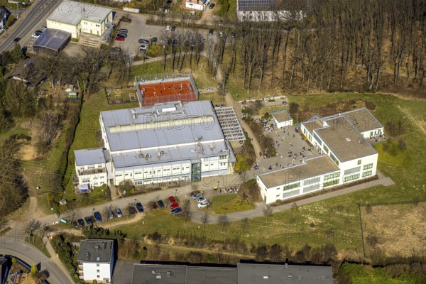 Aerial view, Georg-Müller-Schule comprehensive school with schoolyard and pupils, red football pitch, Schmandbruch, Wetter, Ruhr area, North Rhine-Westphalia, Germany, education, educational institution, football pitch, DE, Europe, football, comprehensive school, educational institute, aerial view, aerial photography, aerial photography, school, overview, bird's-eye view, Wetter (Ruhr), birds-eyes view, overview