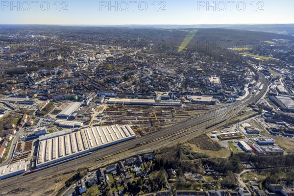 Aerial view, DB InfraGO AG Witten plant and railway tracks, behind Witten main station, Witten, Ruhr area, North Rhine-Westphalia, Germany, railway area, railway tracks, railway station, DE, Deutsche Bahn AG, Europe, commercial enterprises, commercial area, commercial area, commercial property, commercial park, commercial location, commercial use, railway tracks, main station, main railway station, industrial area, industrial location, aerial view, aerial photography, aerial photography, location, overview, bird's-eye view, overview