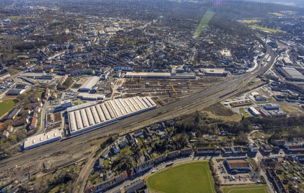 Aerial view, DB InfraGO AG Witten plant and railway tracks, behind Witten main station, Witten, Ruhr area, North Rhine-Westphalia, Germany, railway area, railway station, DE, Deutsche Bahn AG, Europe, commercial enterprises, commercial area, commercial area, commercial property, commercial park, commercial site, commercial use, railway tracks, main station, main station, industrial area, industrial site, aerial view, aerial photography, aerial photography, location, overview, bird's-eye view, overview