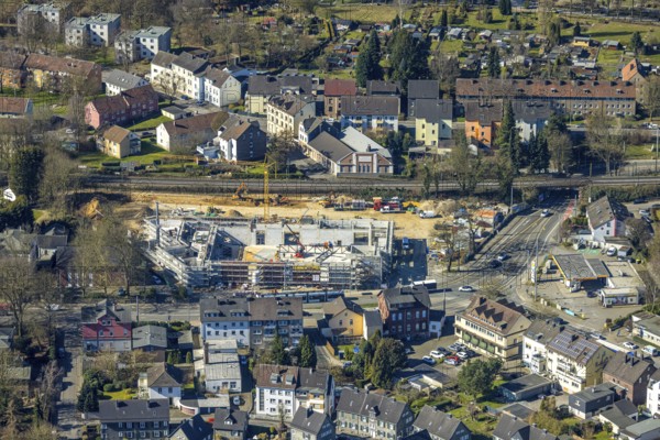 Aerial view, construction site with new building shopping centre Rewe supermarket, Crengeldanzstraße, Witten, Ruhr area, North Rhine-Westphalia, Germany, construction work, construction area, construction site, building plots, construction project, construction site, DE, shopping centre, shopping markets, shopping square, shopping centre, Europe, aerial view, aerial photography, aerial photography, local supply centre, new building, location, shopping centre, supermarket, overview, bird's eye view, bird's eye view, overview