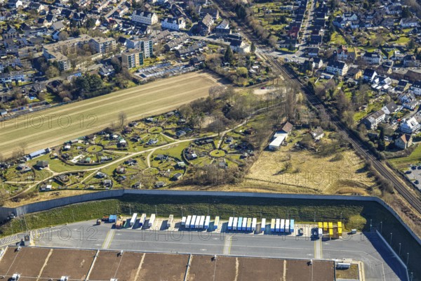 Aerial view, KGV allotment garden association Mellmausland with circular arrangement, at the Amazon logistics centre, Rüdinghausen, Witten, Ruhr area, North Rhine-Westphalia, Germany, DE, Europe, community garden, KGV, allotment garden, allotment garden site, allotment garden association, allotment gardener association, allotment garden colony, aerial view, aerial photography, aerial photography, location, allotment garden, overview, bird's-eye view, overview