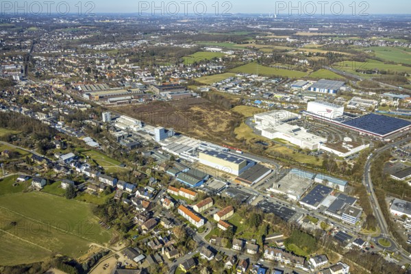 Aerial view, Ardex Chemie industrial area, Friedrich-Ebert-Straße, on the right the furniture store Ostermann, on the left industrial park and technology park Annen, fallow land former landfill and armoured track, Rüdinghausen, Witten, Ruhr area, North Rhine-Westphalia, Germany, DE, Europe, aerial view, aerial photography, aerial photography, location, overview, bird's-eye view, overview