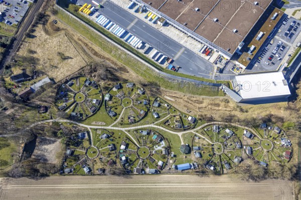 Aerial view, KGV allotment garden association Mellmausland with circular arrangement, at the Amazon logistics centre, Rüdinghausen, Witten, Ruhr area, North Rhine-Westphalia, Germany, DE, Europe, community garden, KGV, allotment garden, allotment garden site, allotment garden association, allotment gardener association, allotment garden colony, aerial view, aerial photography, aerial photography, location, allotment garden, overview, bird's-eye view, overview