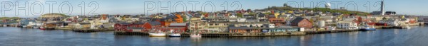 Panoramic photo harbour and town view, Street Art Eternal Light Eternal Night, observatory, church, Vardø, Finnmark, Norway, Scandinavia, Europe, adventure travel, place of worship, astronomy, tourism, religious community, place of worship, graffiti eternal light eternal night, Hurtigruten, Hurtigruten voyage, parish, denomination, cruise, NOR, panorama, panoramic view, panoramic photo, pile dwellings, travel, destination, religion, sea voyage, sightseeing, tourism, Vardø Church, Norwegian, Scandinavian, touristic